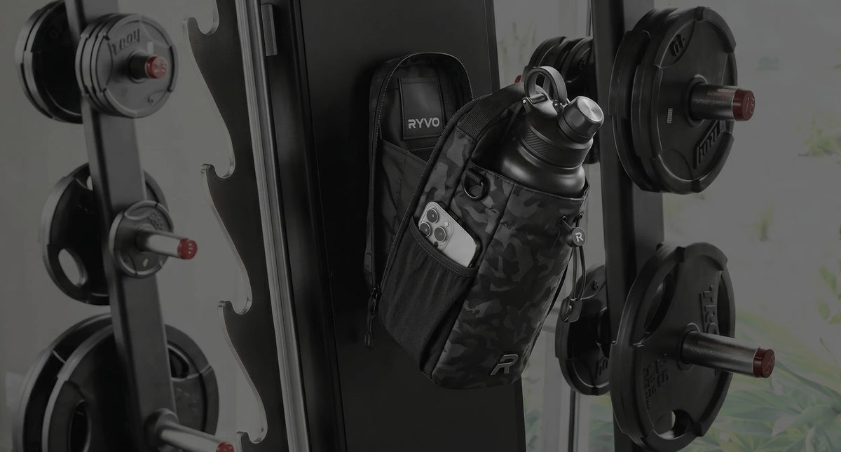 RYVO bag hanging on a gym weight rack